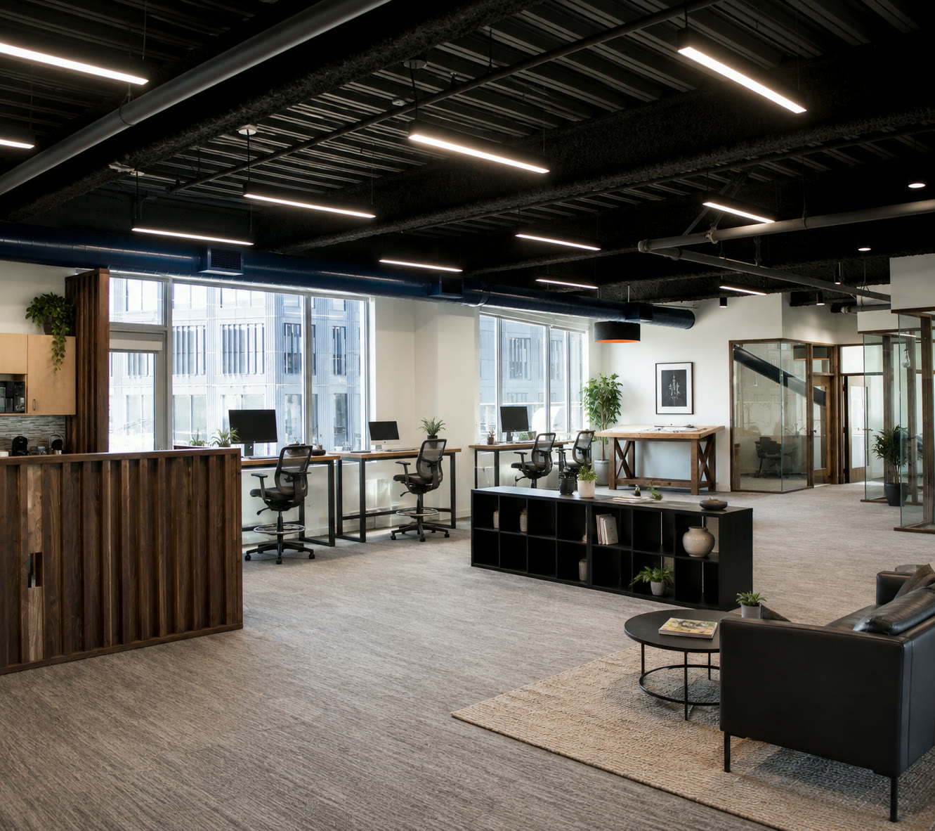 Private executive office with warm oak, brushed brass, and dramatic natural light