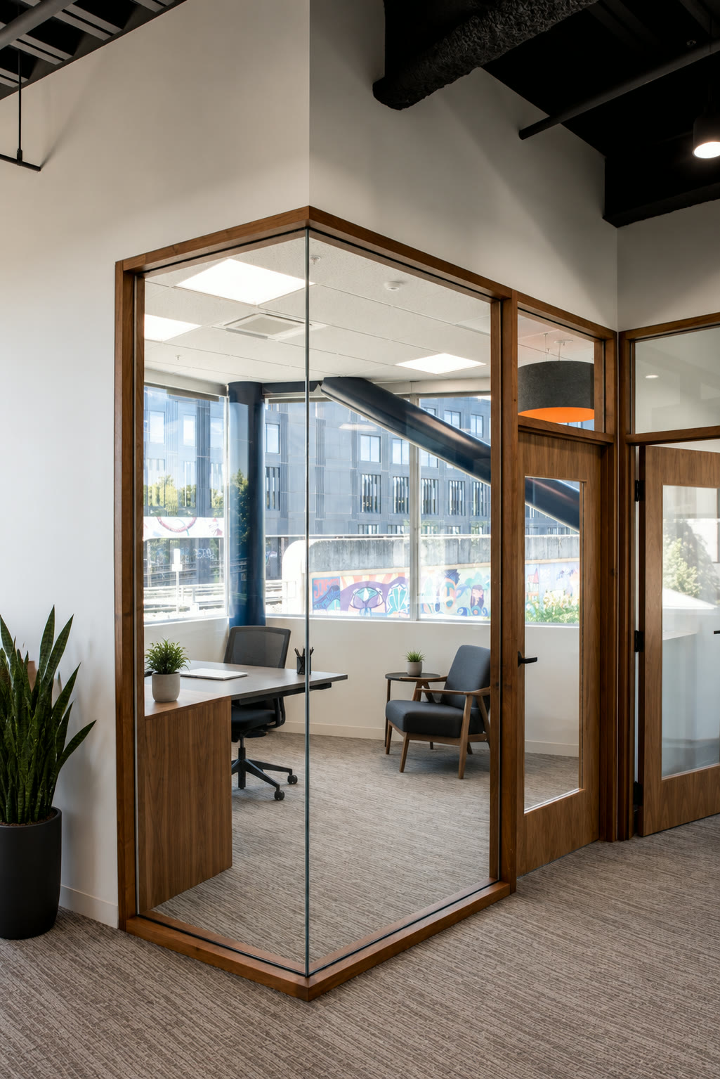 Open executive workspace with warm oak and natural light